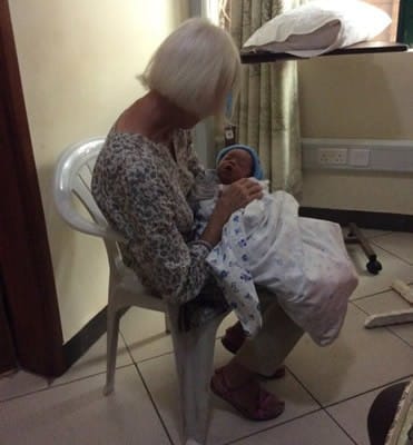 Jane and a baby in hospital