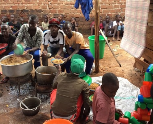 Feeding the homeless children in Uganda