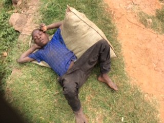 A street boy resting without fear