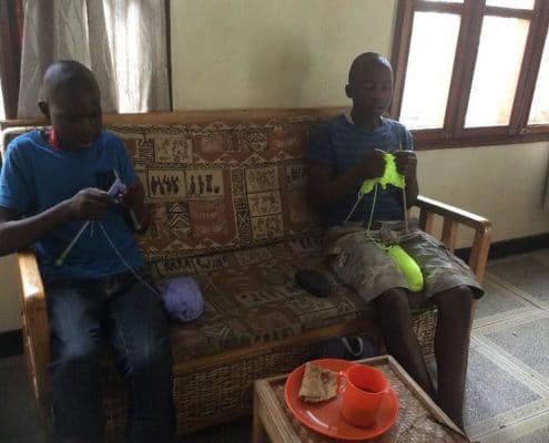 Street boys knitting