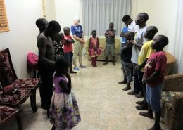 Street children praying in the New Year