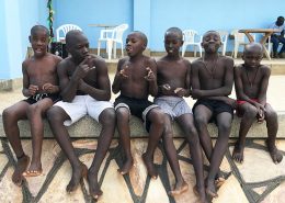 Street children at the swimming pool