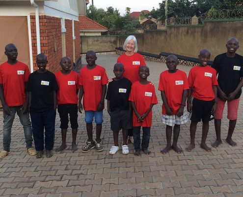 Jane and the street children in new T shirts