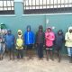 The street children in new raincoats