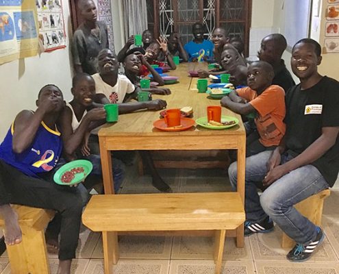 Street children having afternoon tea