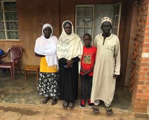 Abdul with his grandfather, aunt and mum