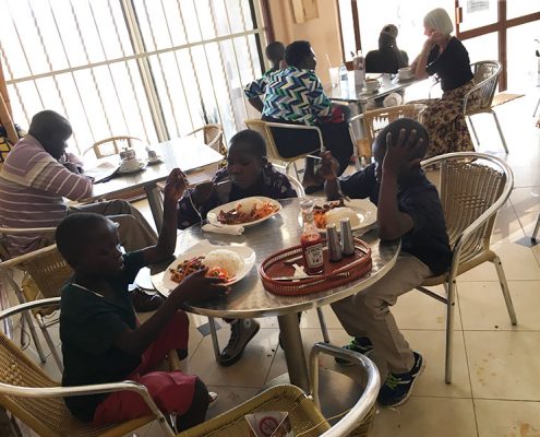 Our street children enjoying their lunch