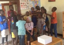 Street children welcoming Jane back