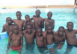 Street children at the swimming pool