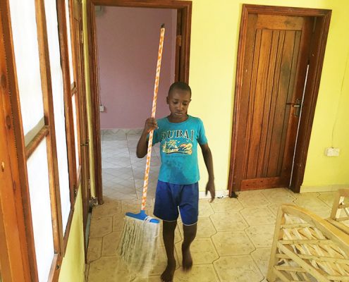 One of the street children cleaning