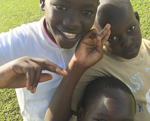 Three of our children at Munyonyo