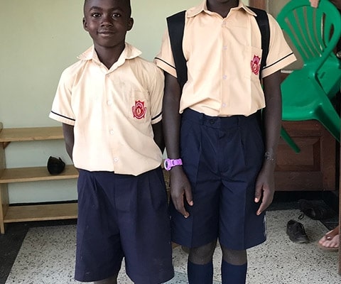 Two street children back from school