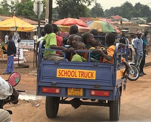 Children travel to school in Uganda