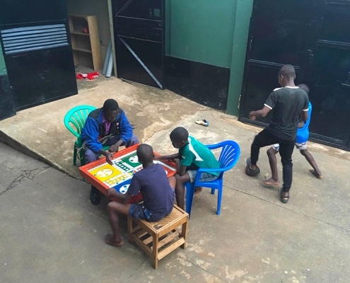 Street children playing Ludo