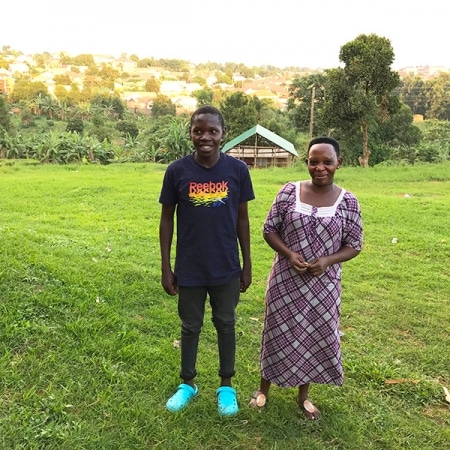 One of our street children with his mother