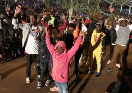 Street children praying at New Year
