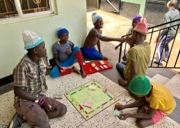 Street children in new knitted hats