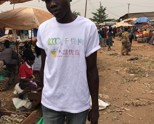 A Ugandan boy who carries our shopping