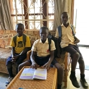 Three of our street boys back from school