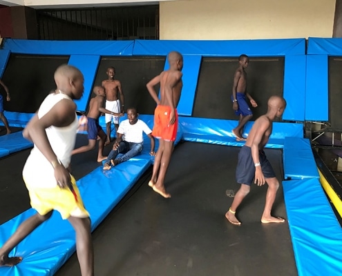 Street children trampolining