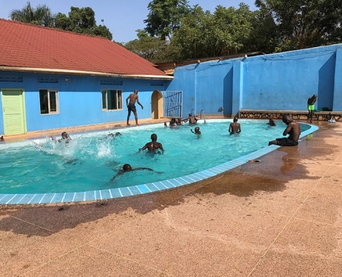 Street children in the swimming pool