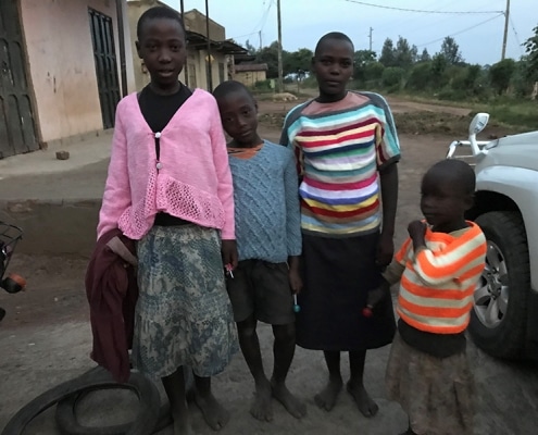 Donated new jumpers for Ugandan children