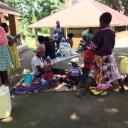 Donated jumpers and toys for children in Uganda