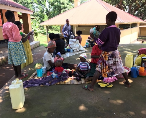 Donated jumpers and toys for children in Uganda