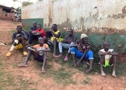 Street children watching football