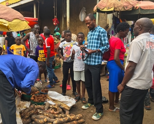 Street boys buying cassava