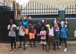 Street children with soft toys