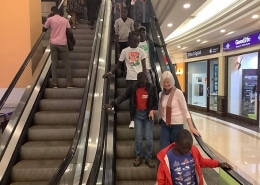 Street children using an escalator