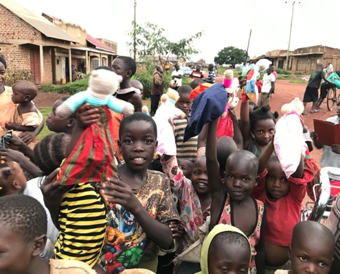 Ugandan children with donated teddies