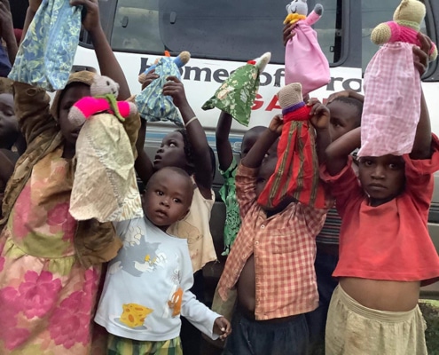 Children with donated teddies