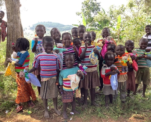 Ugandan children with donated jumpers