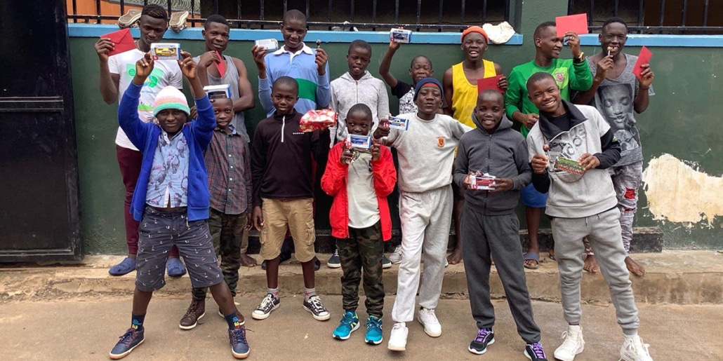 Street children with donated Christmas gifts