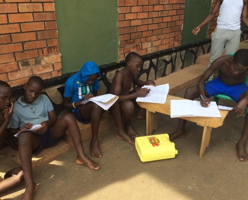 Street children doing their homework