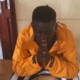 A street boy praying
