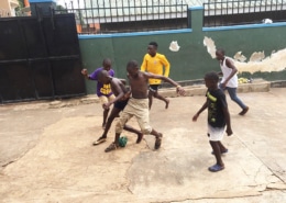 Street children playing football