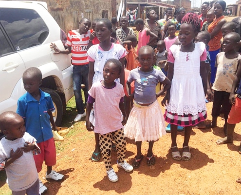 Donated clothes and shoes given to children