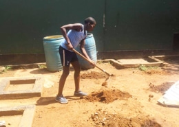 Former street child gardening