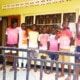 Former street children with new T-shirts