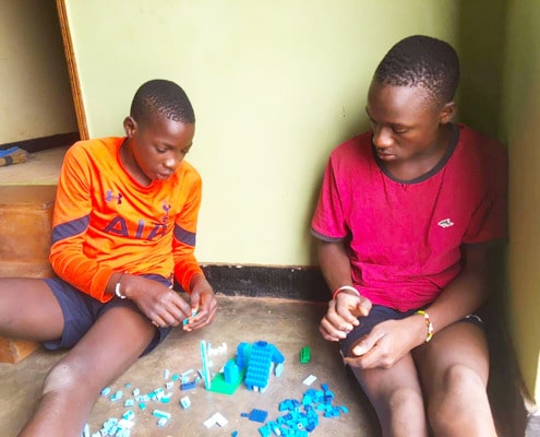 Street children with donated Lego