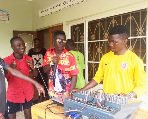 Former street children with a music centre