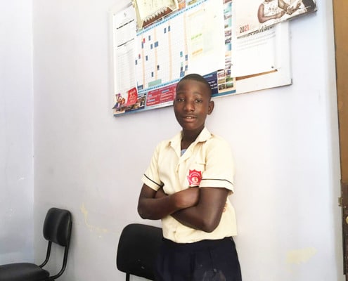 A former street child at school