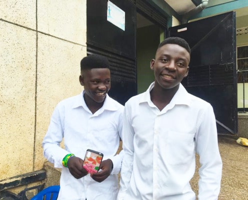 Two Ugandan boys returning to college