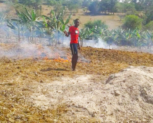 Anton burning his land to help grow crops