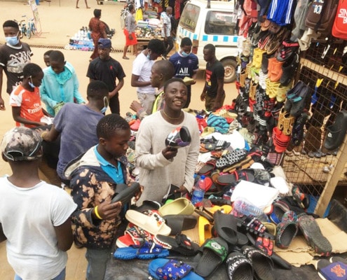 New sandals for street boys in Kampala