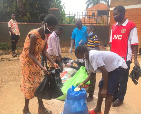 Our boys measuring food for donations