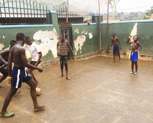 Our boys playing football in the rain